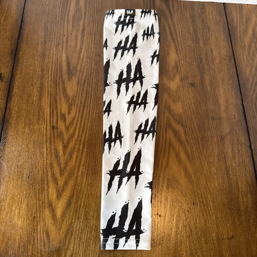 SLEEFS Arm Sleeve Size S/M Black And White HA HA HA Football Baseball
